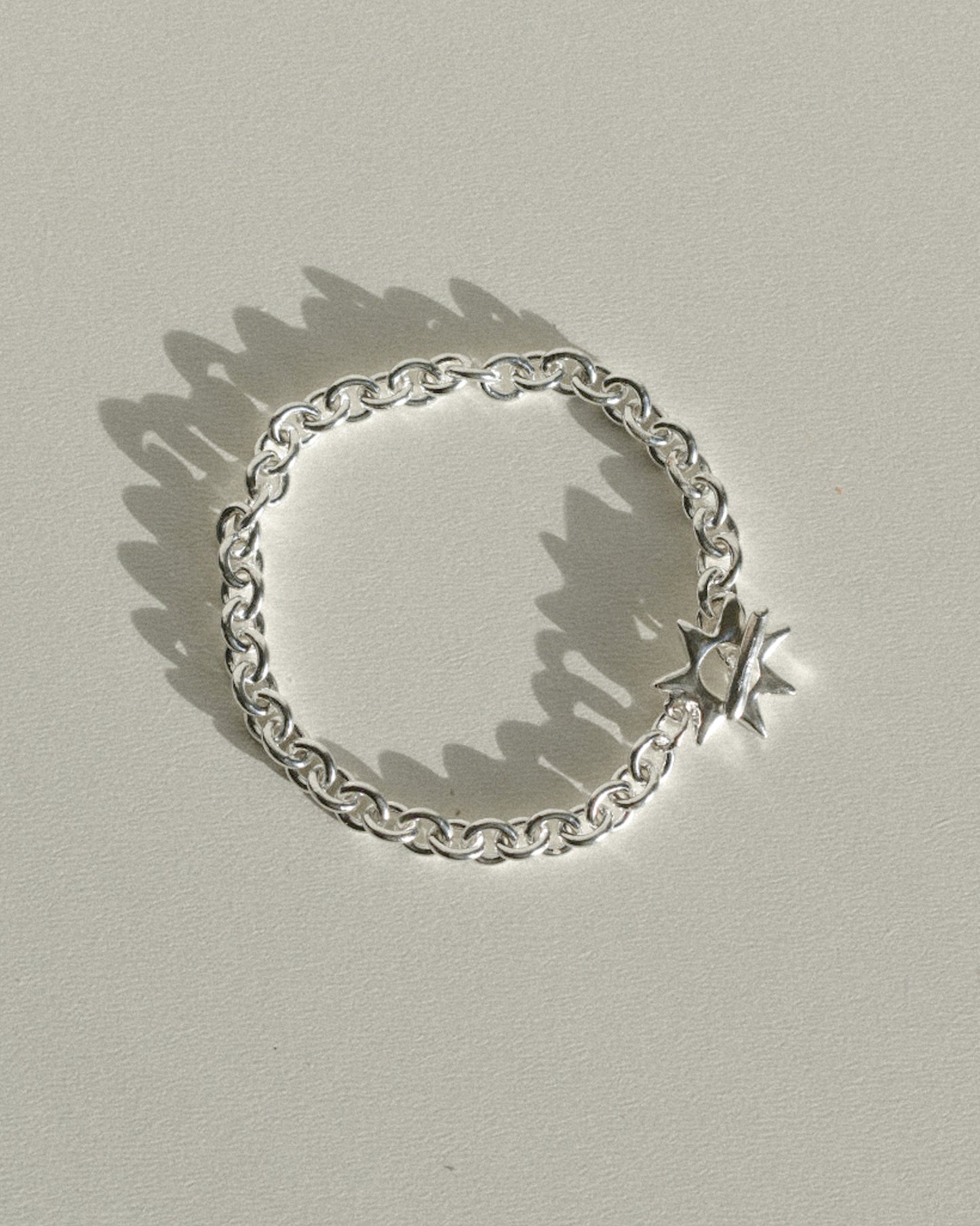 solid recycled silver heavy quality chain bracelet with hand carved star shaped toggle clasp