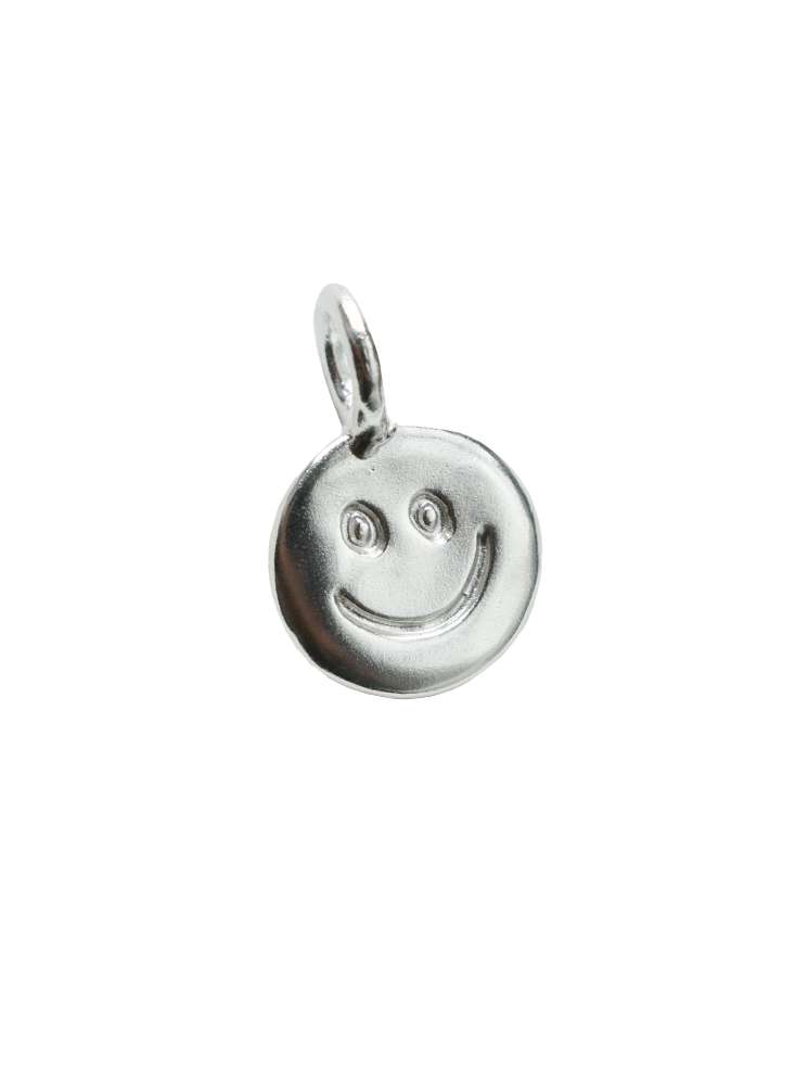 smiley hand carved doodle on a silver shiny disk pendant