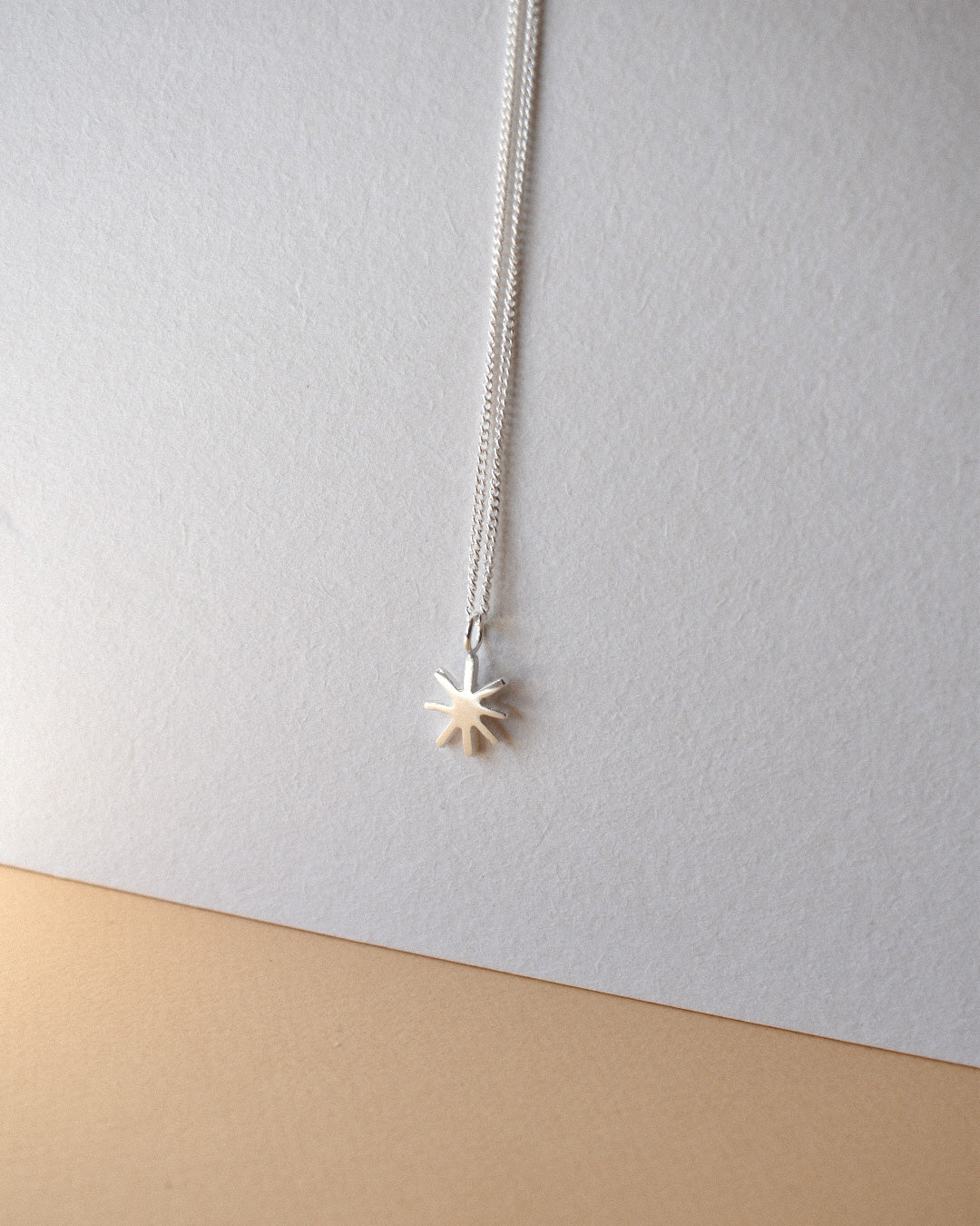 mini sunbeam sunshine shaped solid silver pendant necklace on chain. handmade solid recycled silver