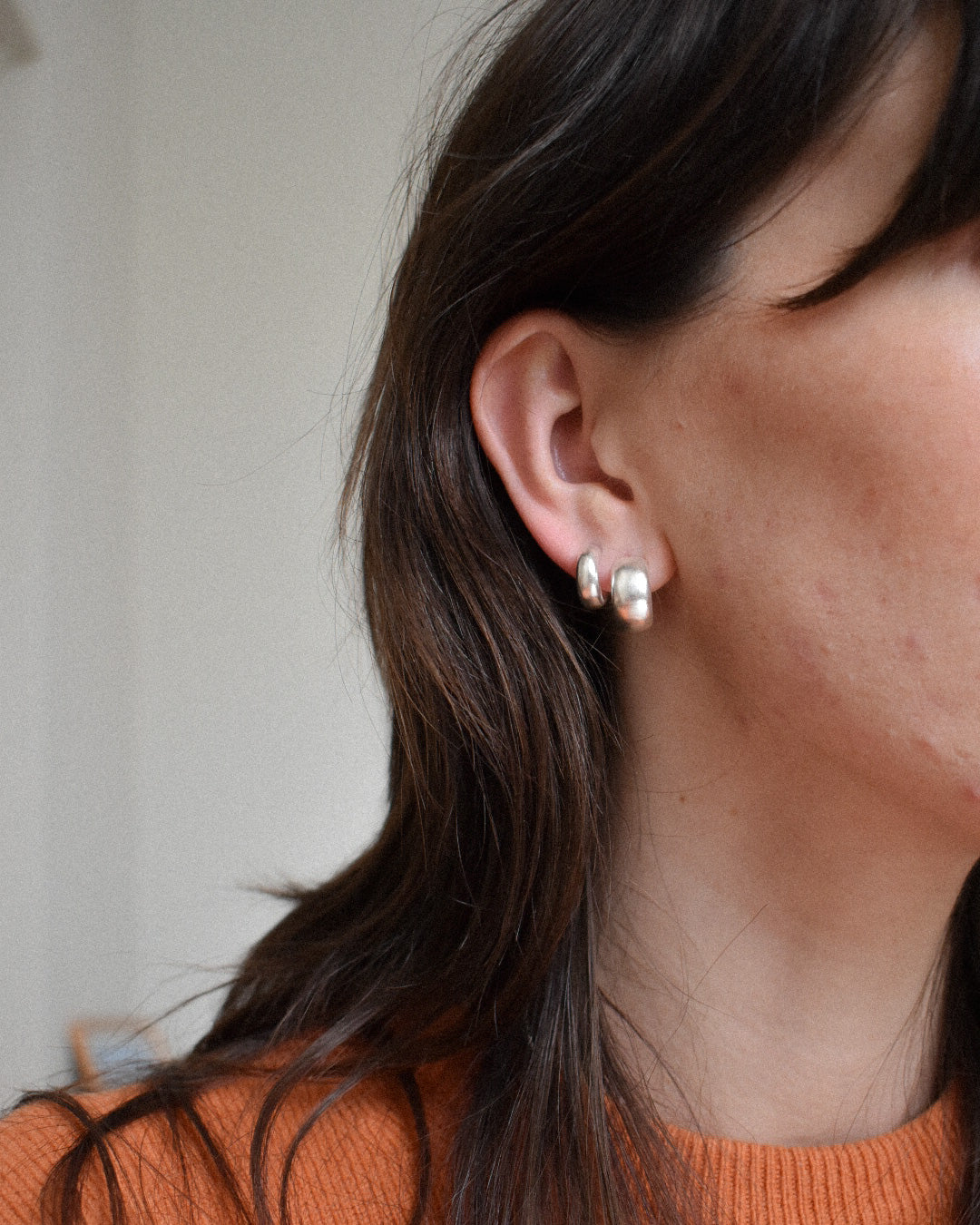 minimal smooth and shiny solid recycled silver hoop earrings with push backs.