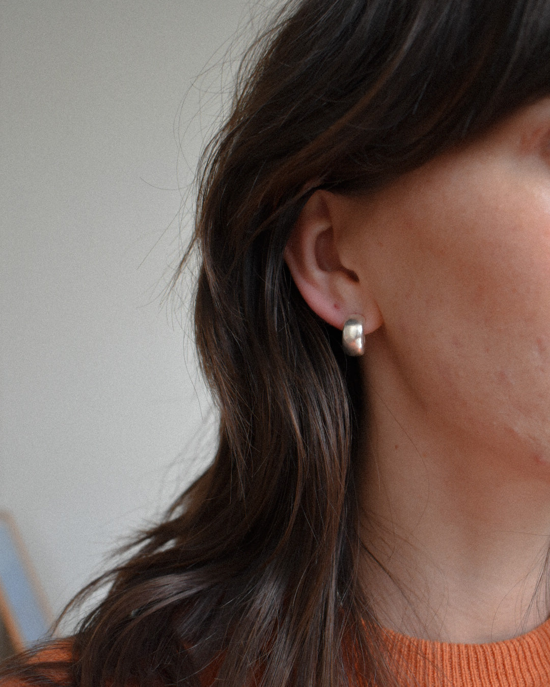 minimal smooth and shiny solid recycled silver hoop earrings with push backs.