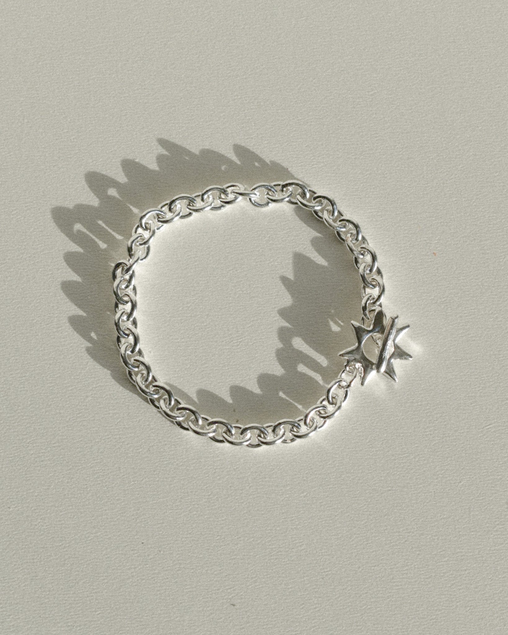 solid recycled silver heavy quality chain bracelet with hand carved star shaped toggle clasp