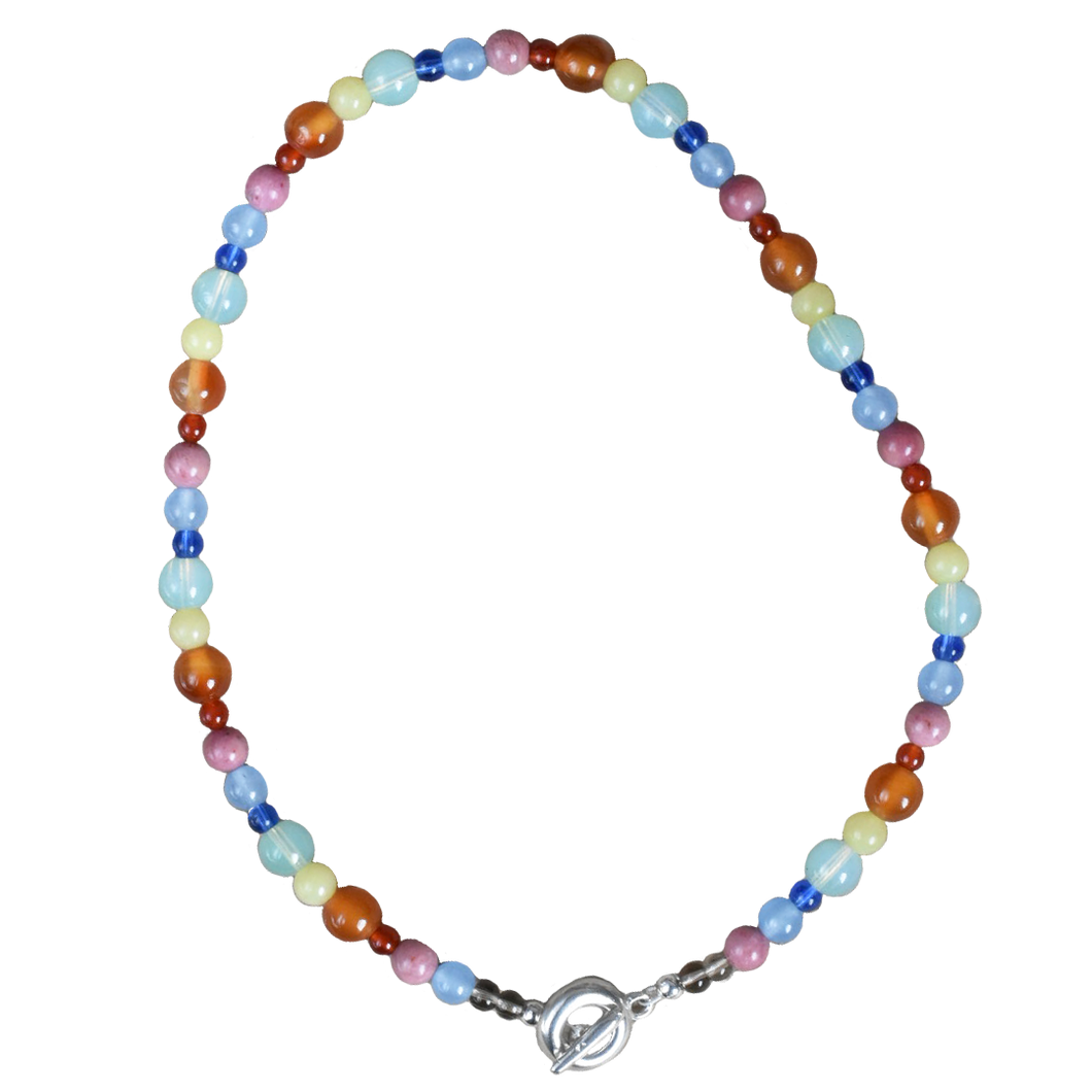colour party beaded necklace, bright rainbow stone and glass beads. blue jade, agate, carnelian, rhodonite. finished with solid recycled silver doughnut toggle clasp.