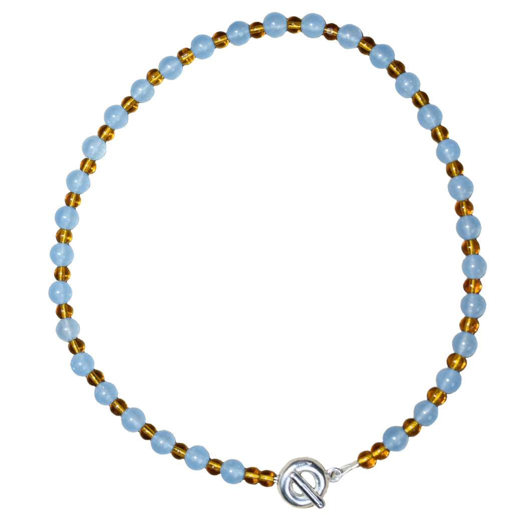 colourful beaded necklace in brown glass beads and baby blue jade semi precious stones. finished with hand carved solid recycled silver doughnut clasps.