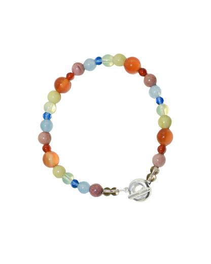 colour party beaded bracelet, bright rainbow stone and glass beads. blue jade, agate, carnelian, rhodonite. finished with solid recycled silver doughnut toggle clasp.