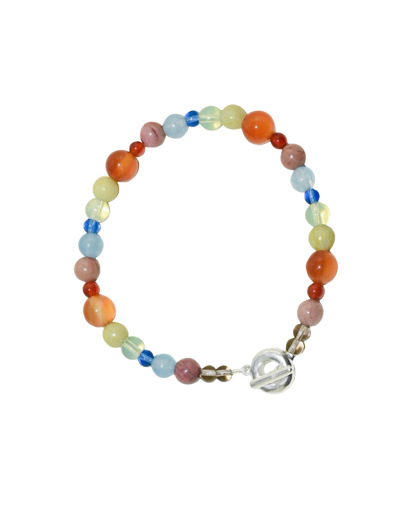 colour party beaded bracelet, bright rainbow stone and glass beads. blue jade, agate, carnelian, rhodonite. finished with solid recycled silver doughnut toggle clasp.