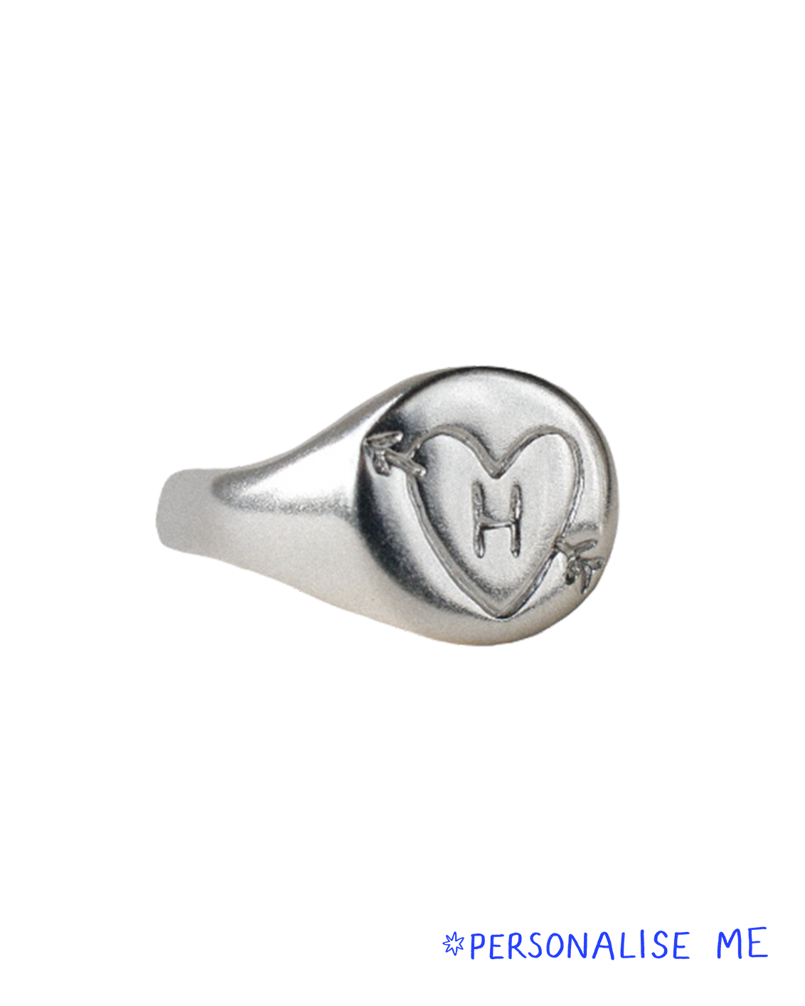 hand carved and personalised solid recycled silver signet ring. etched into with doodle of a heart and arrow and initial. 