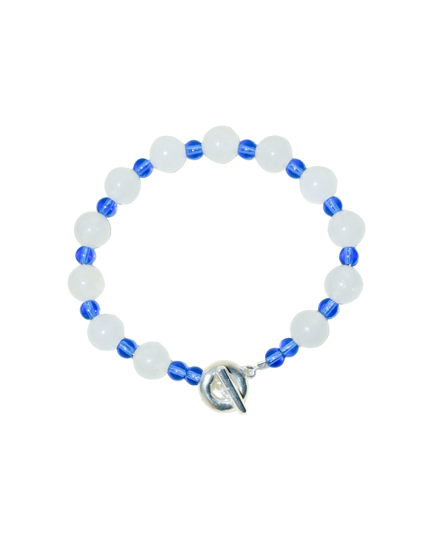 icicle beaded bracelet. blue and white with glass beads and large round white jade. finished with solid recycled silver doughnut toggle clasp.