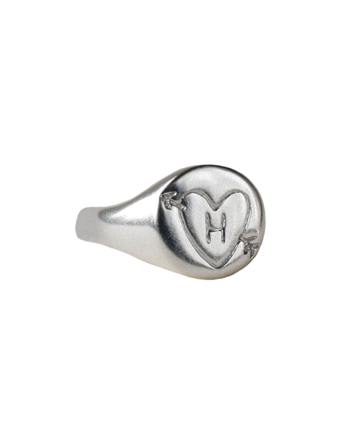 hand carved and personalised solid recycled silver signet ring. etched into with doodle of a heart and arrow and initial. 