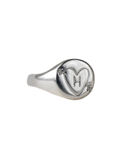 hand carved and personalised solid recycled silver signet ring. etched into with doodle of a heart and arrow and initial. 