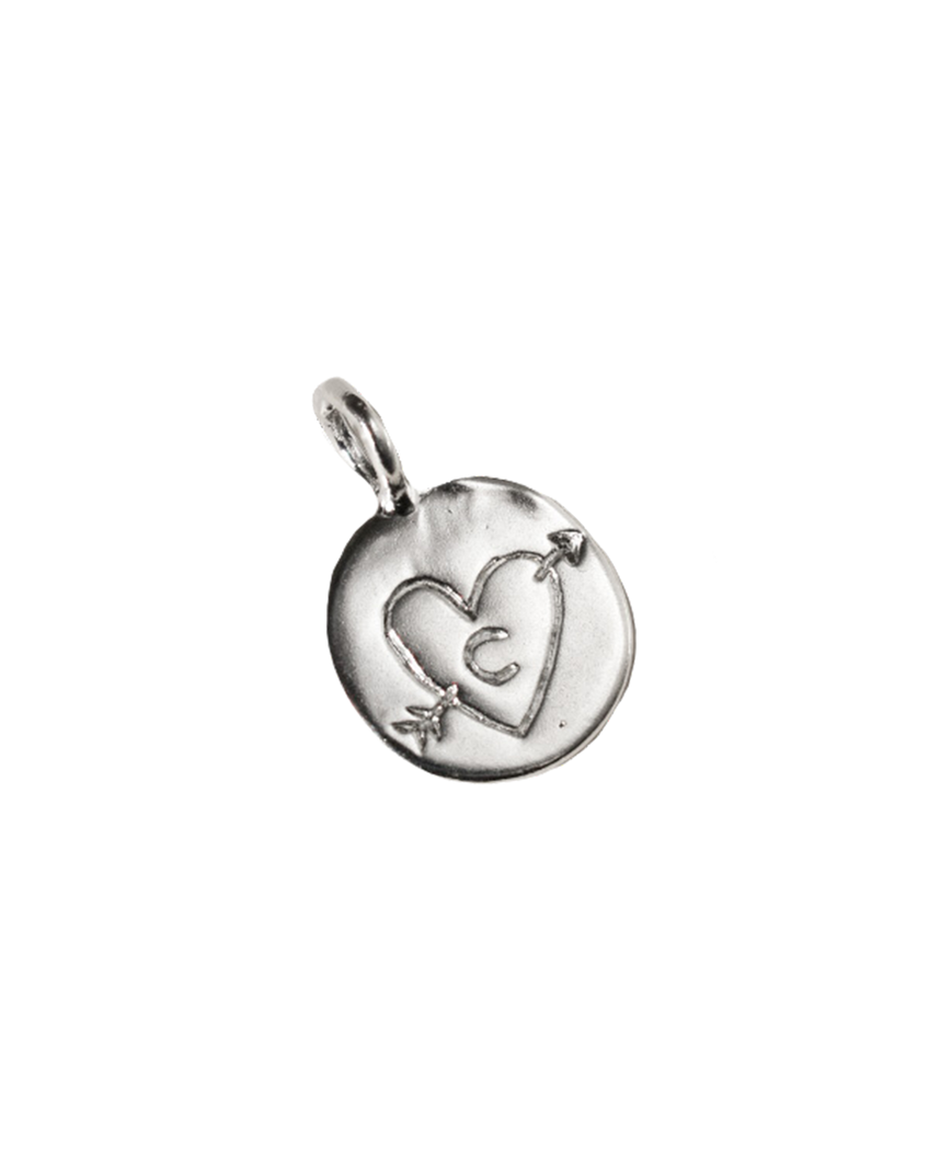 hand carved and personalised solid recycled silver pendant. etched into with doodle of a heart and arrow and initial. 
